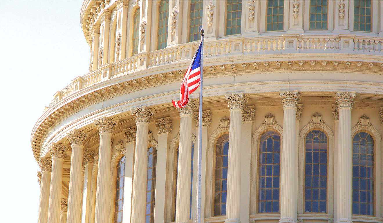 U.S. Capitol building with American flag in front