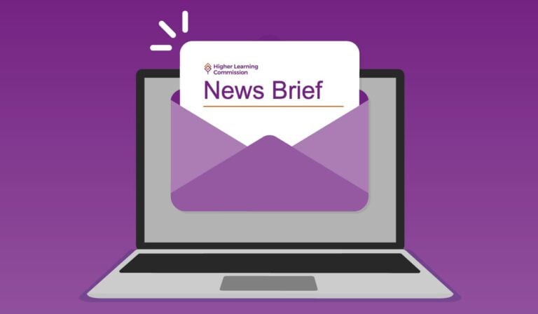 A letter coming out of a laptop that says "News Brief"